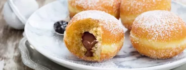 Des beignets au chocolat fourré avec pâte à tartiner Milka®