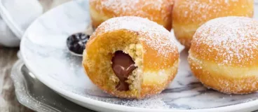 Des beignets au chocolat fourré avec pâte à tartiner Milka®