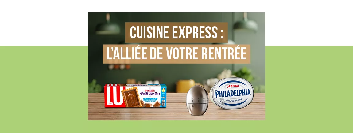 Des packs Philadelphia et Petit écolier et une horloge sur un plan de travail